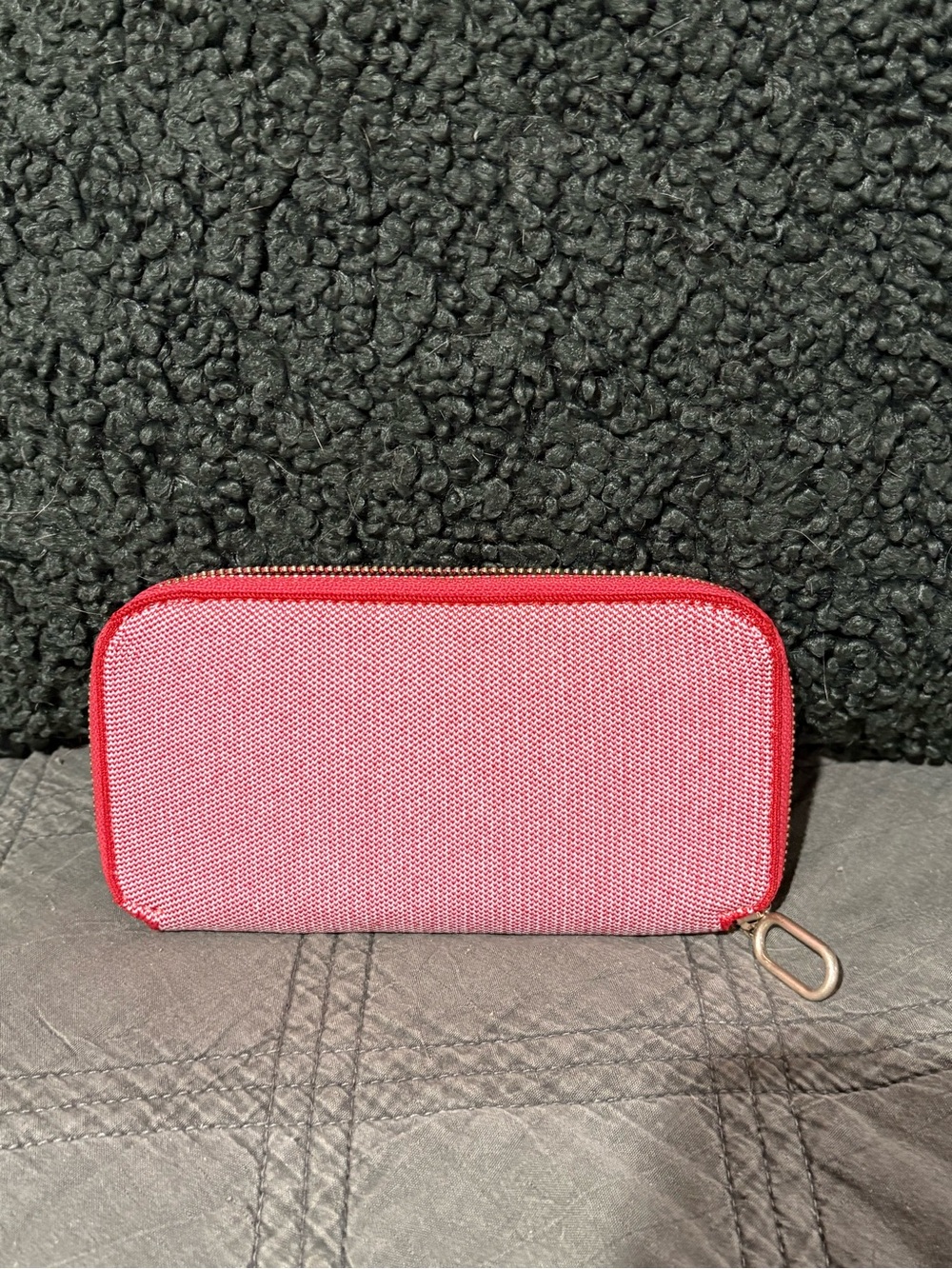 Rothy’s red zip wallet